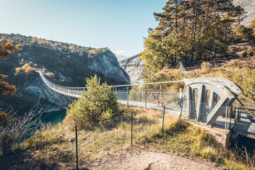 Hiking in autumn and discovery of the landscape of the Drac Himalayan footbridge, in Isère and the Auvergne-Rhône-Alpes region in France