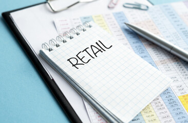 A notebook with the word Retail written on it