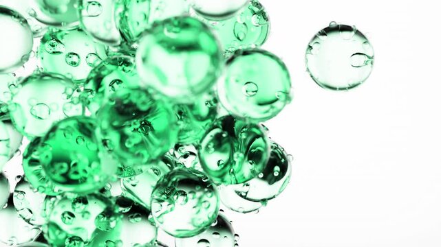 Abstract animation of light green and transparent spheres floating and intersecting, creating an illusion of bubbles in water. Perfect for backgrounds, conceptual videos, and advertising graphics.
