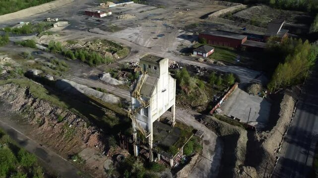 High ariel orbit of loading tower at abandoned Yorkshire industrial coking plant.