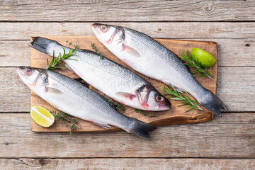 Raw sea bass fish photography . Top view