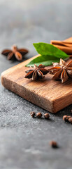 Explore the rich flavors of star anise and cloves on a rustic wooden board