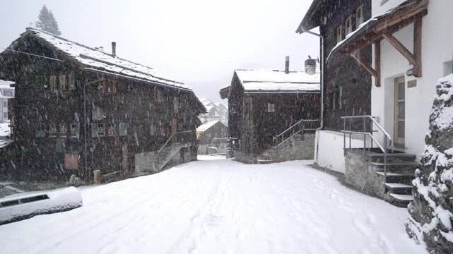 Snowing At The Resort Town Neighbourhood In Blatten bei Naters, Valais, Switzerland. Static Shot