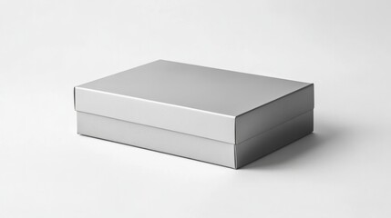 Naklejka premium A minimalist, rectangular metallic silver box with sharp edges, placed on a white background