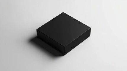 A minimalist square black box with soft shadows and subtle highlights, placed on a white background