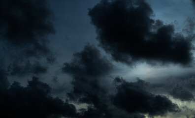 Obraz premium Cloud storm sky dark halloween background rain lightning thunder stoumy typhoon Nature light scene rainy atmosphere damage effect carbon dioxide dust air pollution 2.5 Pm, texture nature windstorm.