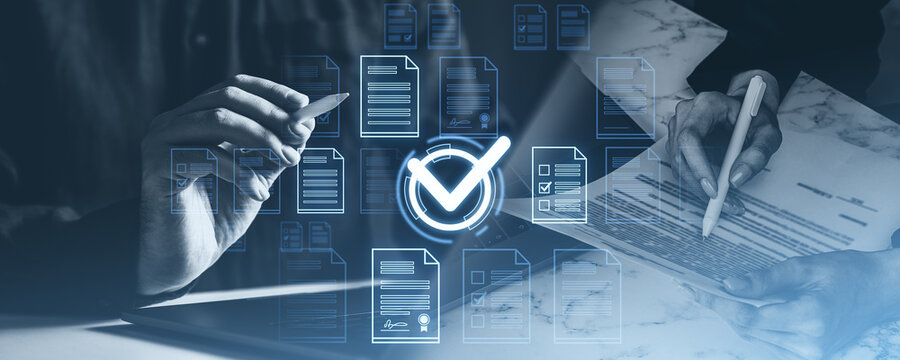 Hands with stylus reviewing documents, digital checkmarks overlay. Blue-toned style, business evaluation concept, approval process