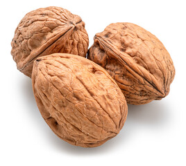 Three whole walnuts isolated on white background. Clipping path.