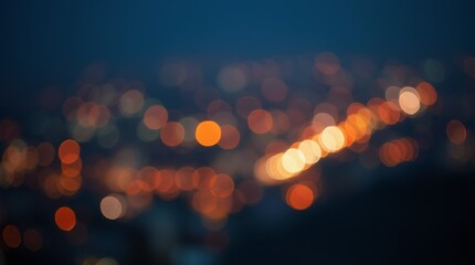 Defocused orange bokeh lights on dark background. Abstract cityscape at night