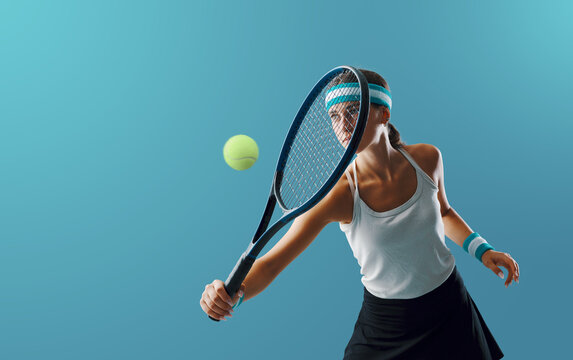 Woman hitting a tennis backhand