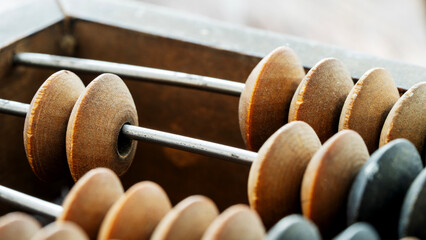 vintage abacus or abacus on wooden background