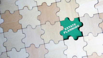 Fototapeta premium ESTATE PLANNING word alphabet letters on puzzle as a background