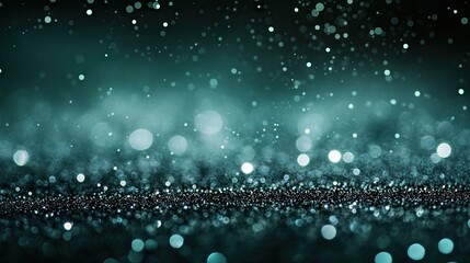 Close-up of an abstract blurred green and silver light bokeh background, ideal for emphasizing an abstract light bokeh effect with a glitter texture on a dark backdrop.
