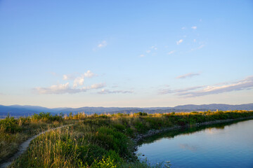 Belizmata Dam with a backdrop of the Pirin Mountains, Bansko, Bulgaria