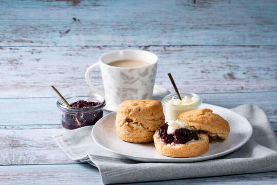 Afternoon tea with homemade scone  -  blue wood backbround 4