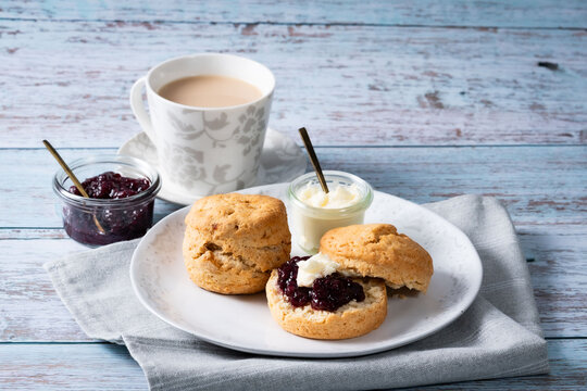 Afternoon tea with homemade scone 1 -  blue wood backbround 1