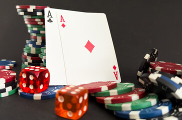 Fototapeta na wymiar poker cards, chips and dice - close up