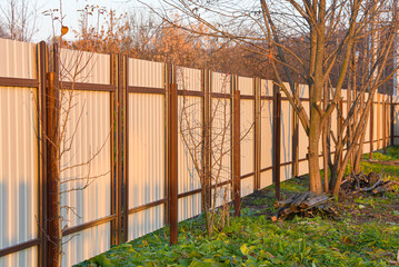 Beautiful metal fence during sunset.