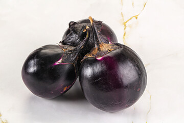Raw violet and black eggplant