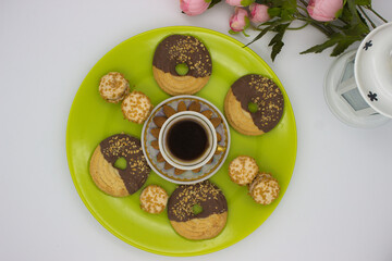 Coffee and Sweets with Almond Garnish