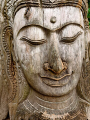 A stunning and beautiful tree sculpture showcasing a serene face