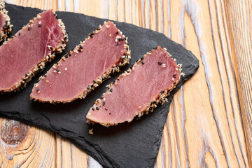Sliced tuna steak with sesame photography . Top view