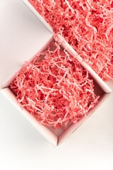 Confetti gift box filler in the box on white background