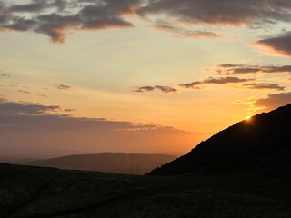 Sunset over the Arthur's Seat hill and the City of Edinburgh, Newington, Scotland, United Kingdom, August 2023