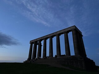 Obraz premium National Monument of Scotland on Calton Hill during the blue hour, City of Edinburgh, Scotland, United Kingdom, August 2023