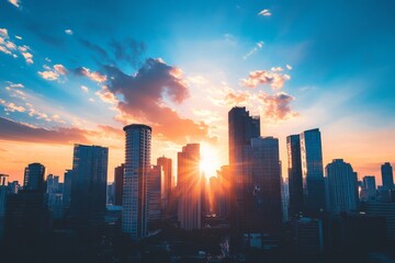 Fototapeta premium A breathtaking city skyline silhouetted against a vibrant, colorful sunset, casting glistening reflections and evoking a sense of wonder and urban splendor.