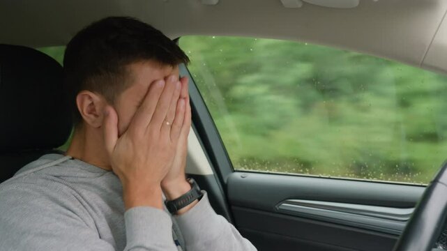 Tired man falling asleep while driving car on highway road. Sleepy male driver closes his eyes and lose concentration. Dangerous driving - Powered by Adobe