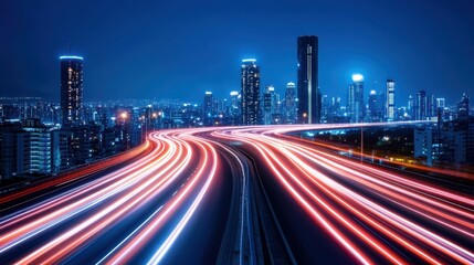 Fototapeta premium Light trails at night in urban cityscape