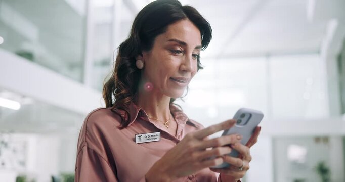 Hospital, typing and woman with smartphone, healthcare and scheduling of appointment, receptionist and online. Digital, reading and person with information on app, administration and medical coder