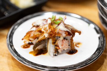 Unagi sushi rolls. Grilled Japanese eel sushi rolls. Famous delicious Japanese food. Close up
