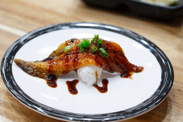 Unagi sushi rolls. Grilled Japanese eel sushi rolls. Famous delicious Japanese food. Close up