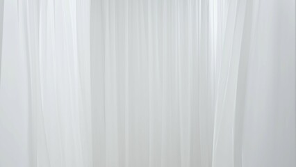 Obraz premium White silk fabrics portieres slowly flying and moving blowing by the wind of air fan in photo video studio, empty space for inserting object.