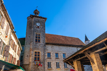 The Place de la Halle and clock tower, in Martel, in the Lot, in Occitanie, France