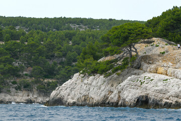 Marseille, France - June 9, 2024 : Calanque of Marseille on the Coast of Provence, Calanques National Park seen from an excursion boat cruising, High quality 4k footage