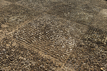 Pebbles floor design background, outdoor day light, garden floor decoration