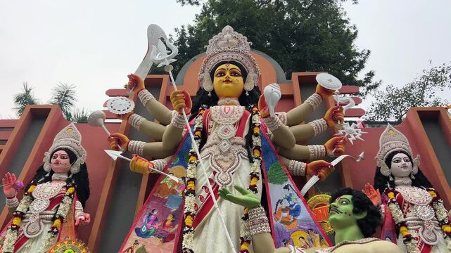 Low angle shot of Goddess Durga Maa of a pandal ready to go to carnival in Kolkata, India.