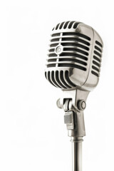 Vintage silver microphone with a classic design, highlighting timeless audio equipment and broadcasting tools.
