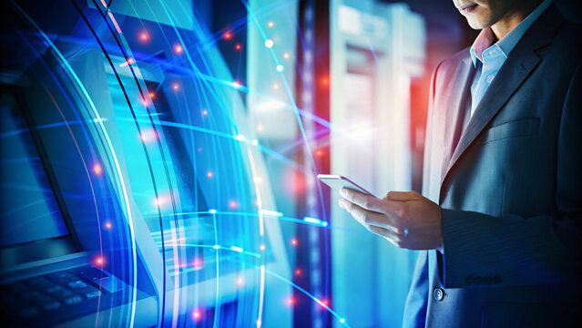man in suit using smartphone near ATM, surrounded by digital effects. scene conveys sense of modern technology and financial transactions
