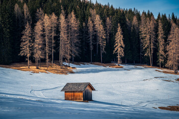 Dolomites in winter. Val Fiscalina, between peaks, larch forests, mountain pines and warm huts.