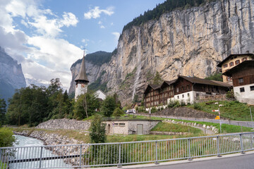 Scenic view of Lauterbrunnen village with waterfall backdrop