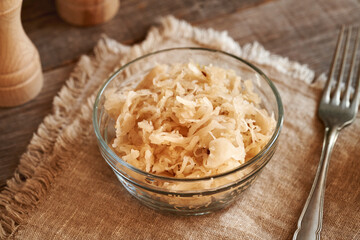 Homemade fermented cabbage or sauerkraut in a glass bowl