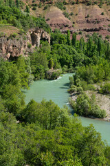Munzur stream. Munzur river rafting trails. Munzur Stream nature park. Green Munzur valley.