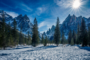 Dolomites in winter. Val Fiscalina, between peaks, larch forests, mountain pines and warm huts.
