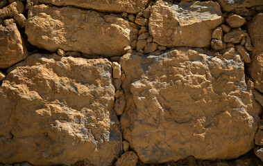 Muro de piedra con textura de roca.