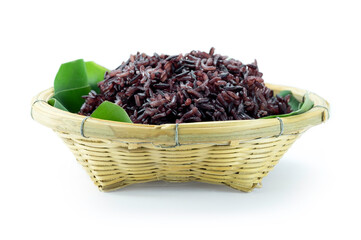 Cooked Oryza sativa, black glutinous (purple, forbidden) rice in wooden basket isolated on white background closed up stacking. Khao niew dam in Thai