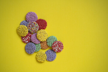 A vibrant pile of colourful candies, is perfect for a joyful birthday celebration. This close-up...